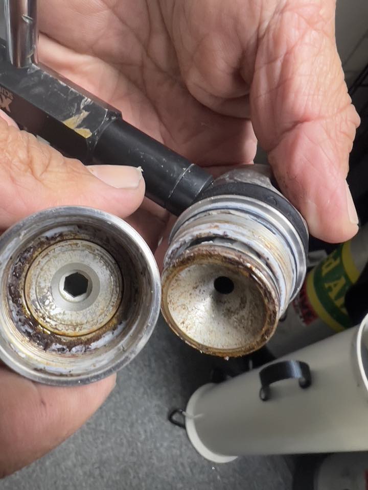 Inside a regulator first stage that went too long without service, with corrosion and salt buildup
