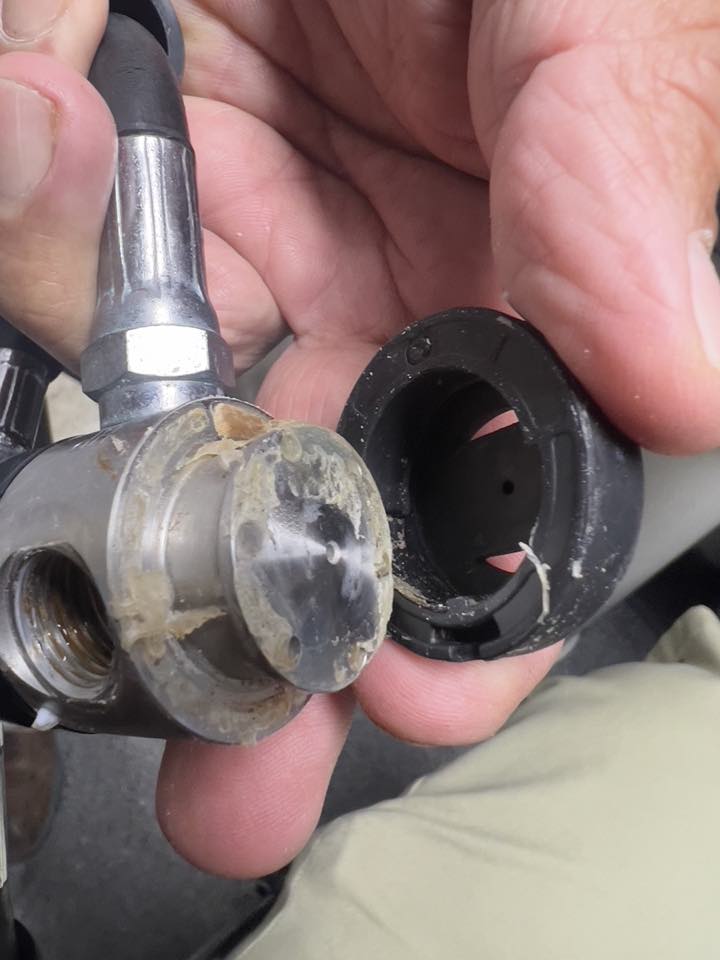 A regulator first stage as it came in, with salt deposits in the ports