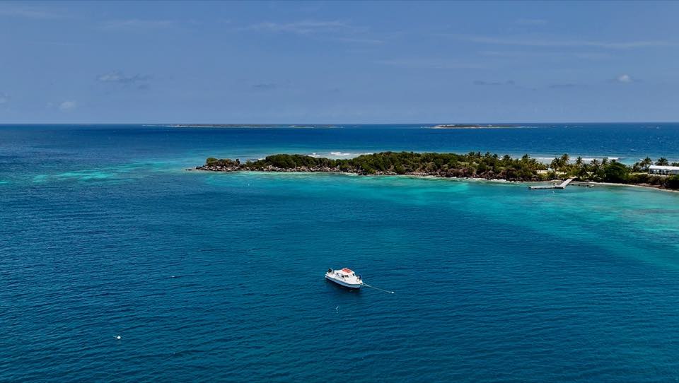 Four Points near a small island, seen from above