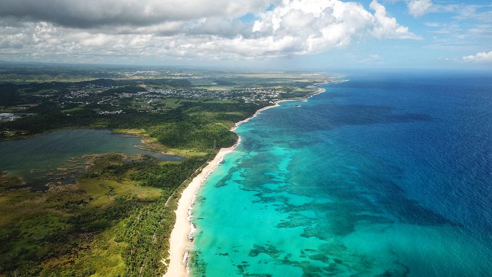 Aerial view of Puerto Rico’s coast and turquoise water