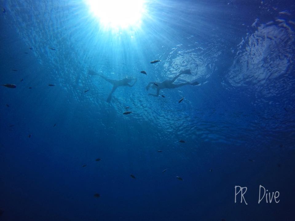 Sunbeams in open blue water