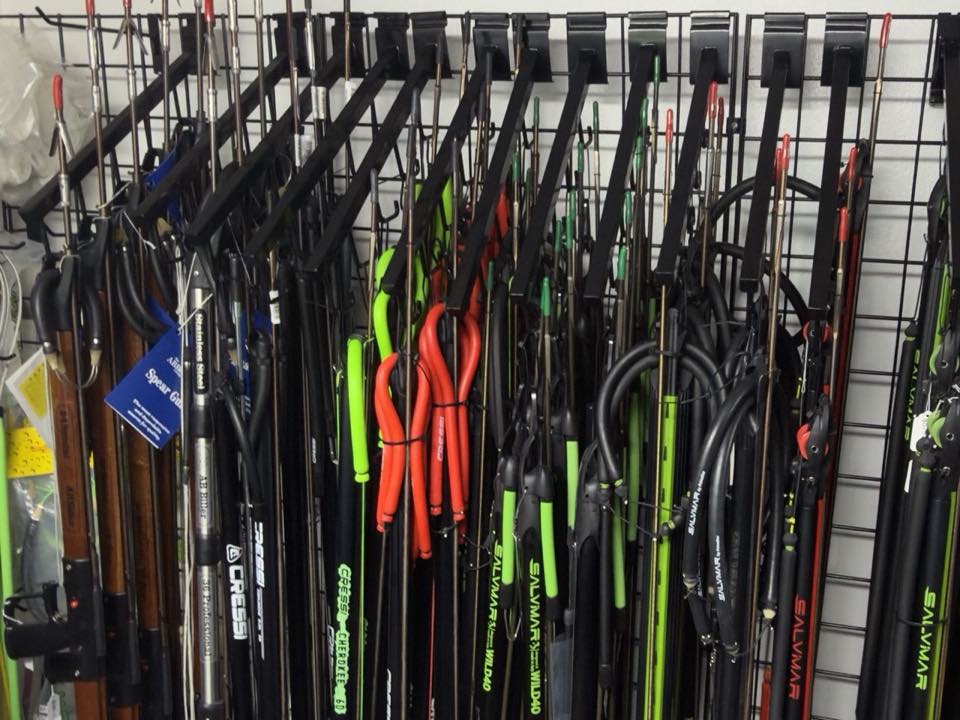 Spearguns on the wall at the shop